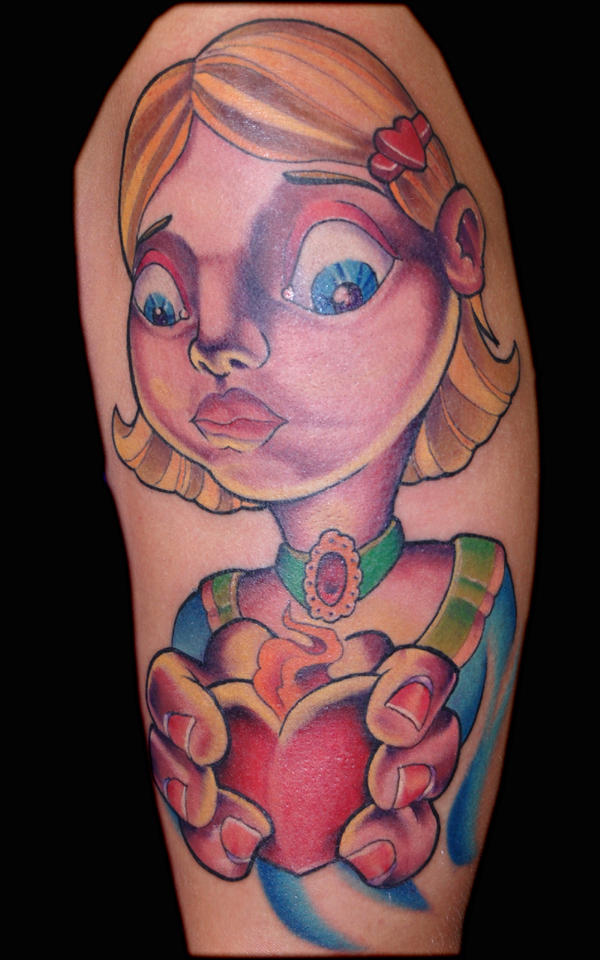 MEMPHIS - little girl holding a heart tattoo
